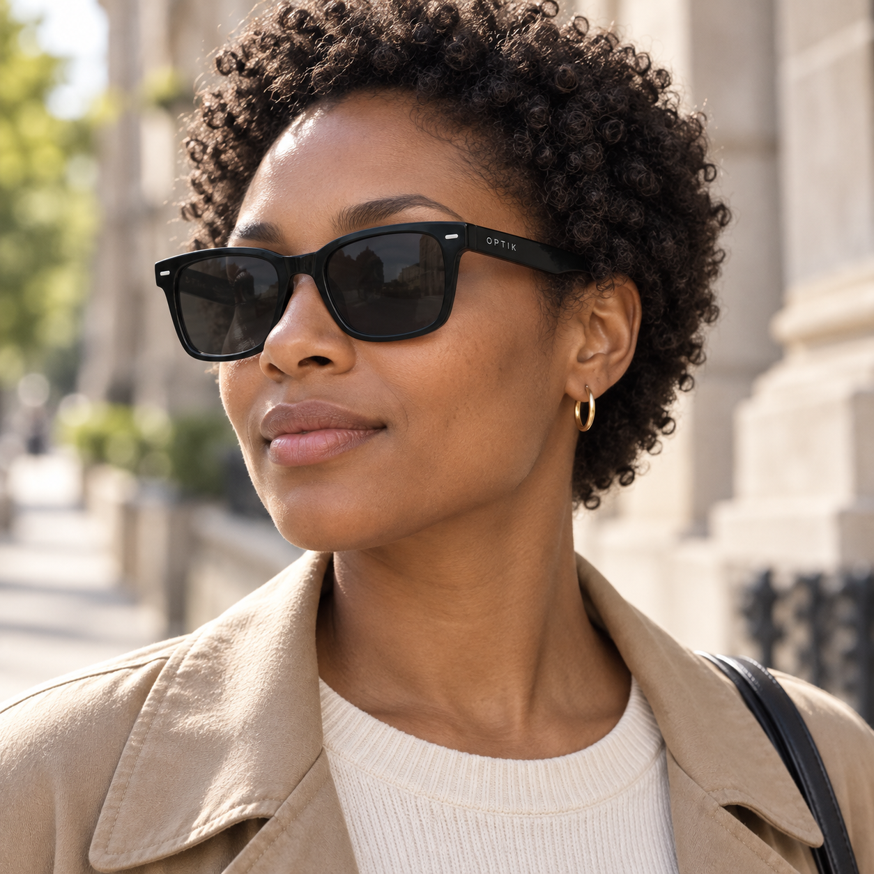 OPTIK Arc — Black frame, Smoke Grey lenses — lifestyle