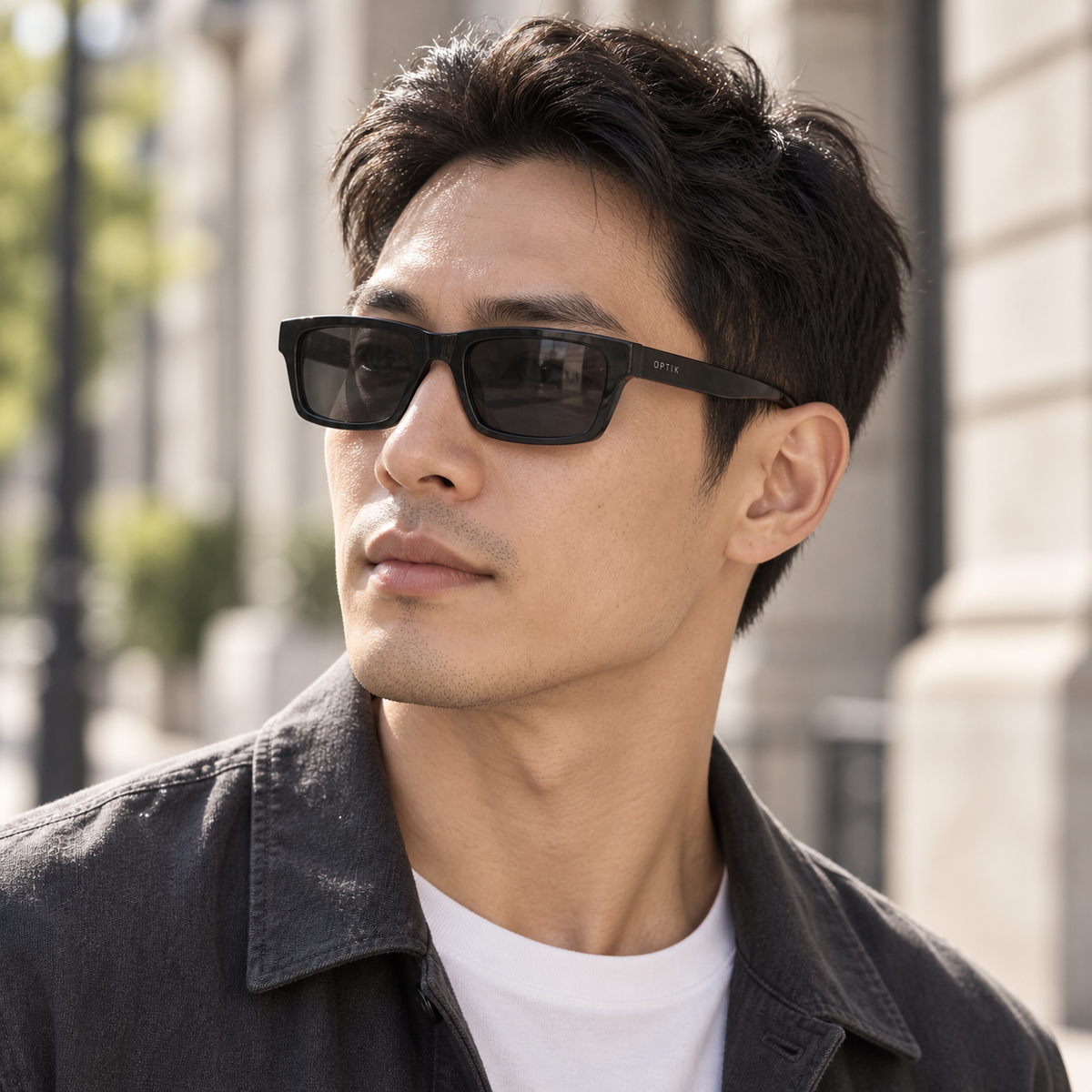 OPTIK Dune — Black frame, Smoke Grey lenses — lifestyle